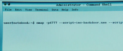 Computer screen shows 'nmap -p6777 --script=iec-backdoor.nse'